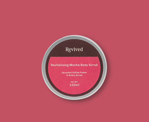 Revived Revitalising Mocha Body Scrub container on a pink background