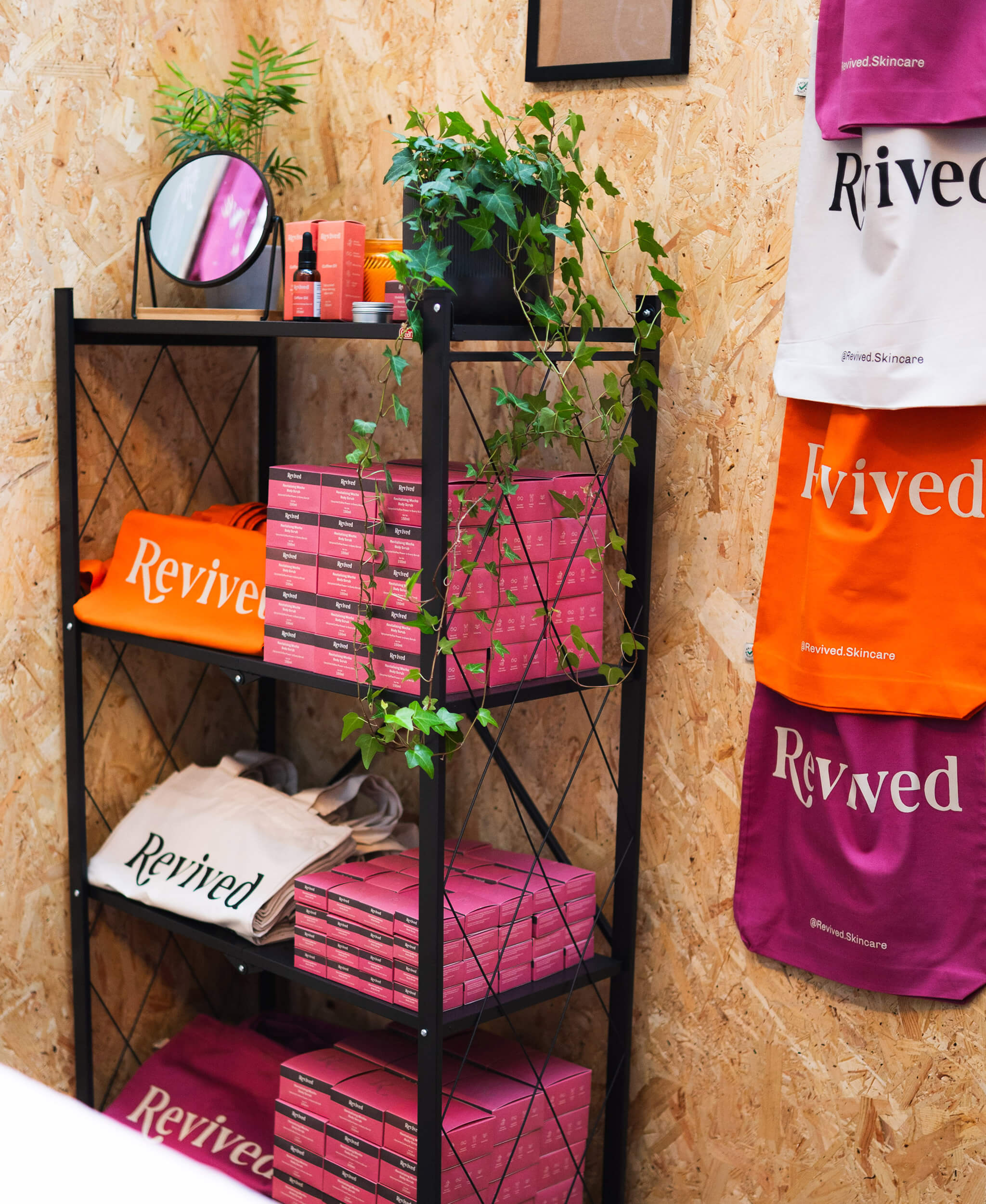 Revved product shelf against textured chipboard wooden wall
